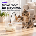 Cream Pawkip UFO cat toy with feather teaser in an indoor playtime scene.